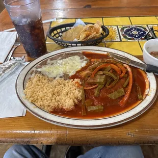 Shrimp patties with nopales rice and beans.