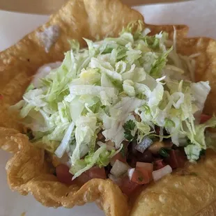 Taco Salad with shredded chicken. Bottom was soggy from too much liquid
