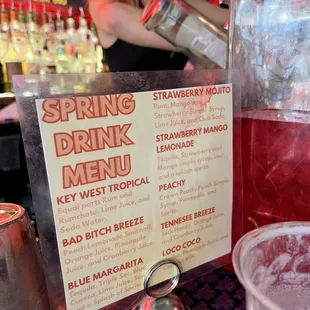 a woman pouring a drink