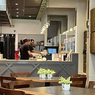 View of the kitchen from our table