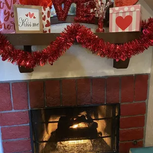 Fire place how sweet! I love the Valentines decorations super cute