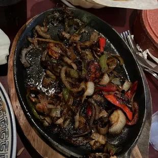 Burned greasy fajitas with NO FLAVOR