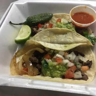 2 Regular Tacos with Carne Asada (steak).