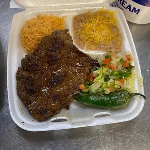 The one and only delicious carne asada plate, with rice and beans. Also a chili toreado!