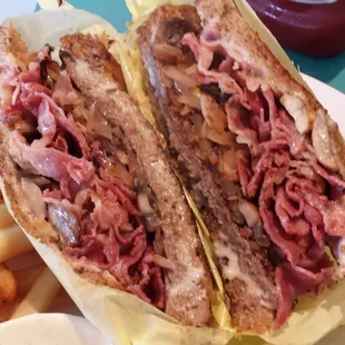 Patty melt with Swiss cheese, grilled mushrooms, onions, and pastrami