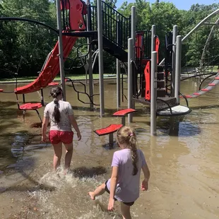 A day before there was severe flash floods, and one of the playgrounds at the entrance was flooded.