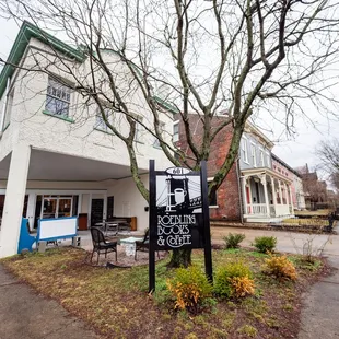 a sign in front of a building