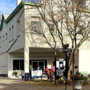 a tree in front of a building