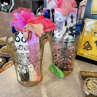 two vases with flowers