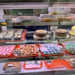 a display of cakes and pastries