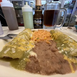 2 enchiladas, one chicken, one mushroom. Sub green sauce instead of ranchero