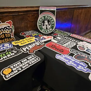 a table covered in stickers