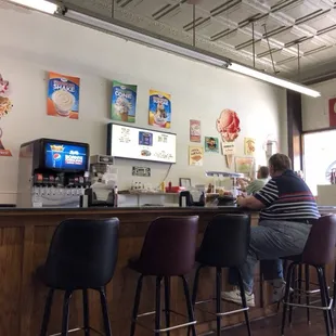 a man sitting at a bar