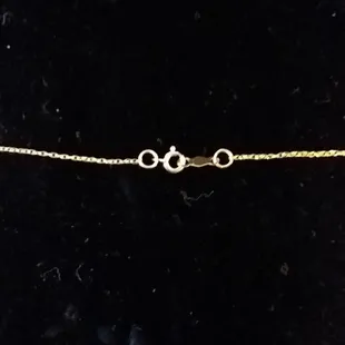 The clasp was so small I couldn't even get it to stay open to put the necklace on!!!