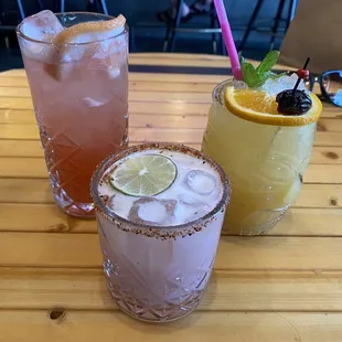 Pool boy is in the middle, to the left a Mocktail Paloma and to the right A good o&apos;l Mai Thai that was amazing too.