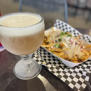 a plate of fries and a glass of milk