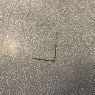 Say the tile didn't need to be pulled up now tile is showing through.