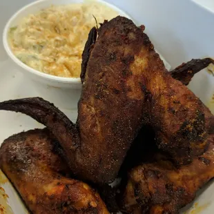 Smoked chicken wings and potato salad with seasoning rub