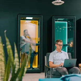 Private phone booths for calls.