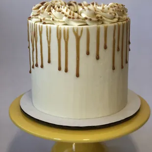 The Alison. Caramel cake layered with bourbon spiked caramel and bourbon vanilla Italian meringue.