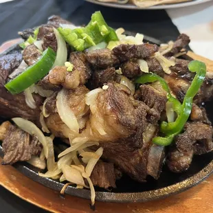 beef and onions in a skillet