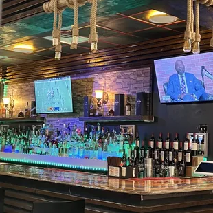 a bar with a large screen