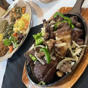 a plate of beef and vegetables