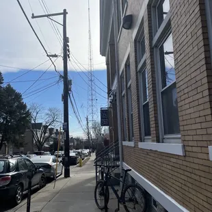 a bicycle parked on the sidewalk