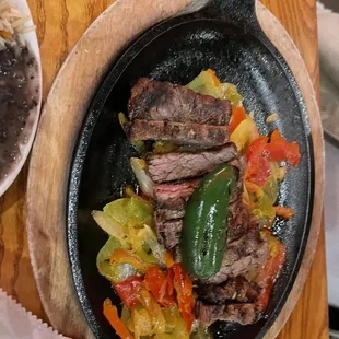 Beef Fajitas which came with choice of tortillas, rice and beans.