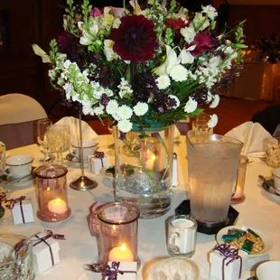 A perfect flower arrangement for your special day.  We rent high quality table clothes, chair covers and bows.