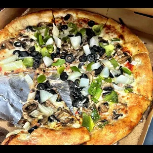 a whole pizza in a box