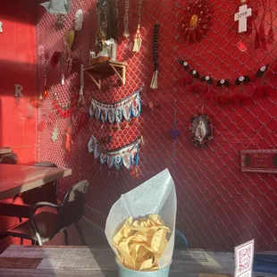 The red wall and the yummy tortilla chips.