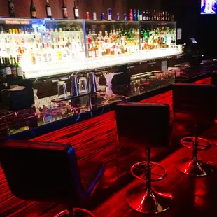 The red lighting illuminates the bar with sexiness (not to mention the beautiful bartenders).