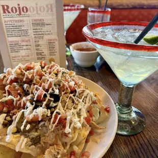 Happy hour nachos and margarita