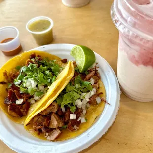 Asada and AL Pastor Tacos. Strawberry horchata. Yum!