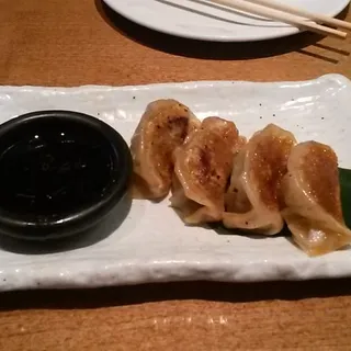 Wagyu Beef and Kimchi Dumplings, Soy Vinaigrette**