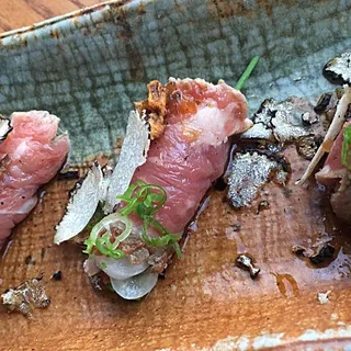 Prime Beef Tataki, Truffle Onion Vinaigrette