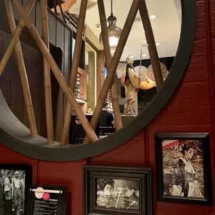 a circular mirror in a restaurant