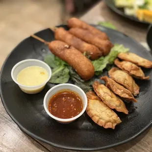 Left: Arabiki Taro Dogs ($7.95), oxtail potstickers ($7.50)  IG: @ohmyono