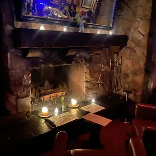 Fireplace seating in front of the Bar