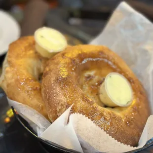 a basket of donuts with butter
