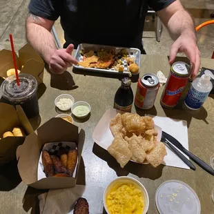 YUM. Tequeños with 3 sauces, fried yucca, plantains, cracklings, Mera ROKO Single Burger Frescolita