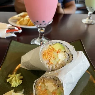 Sushi burrito and strawberry boba tea