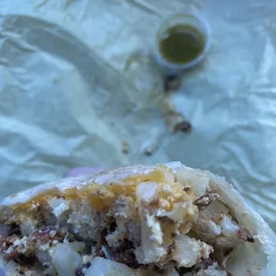 a half eaten burrito