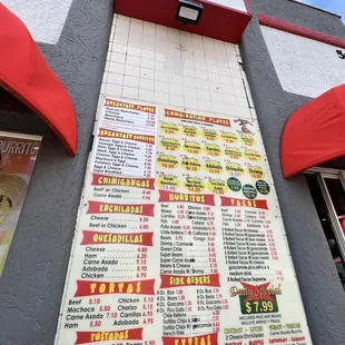 a menu on the outside of a restaurant