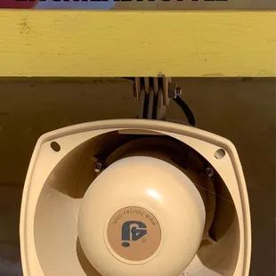 Speaker below menu to place order