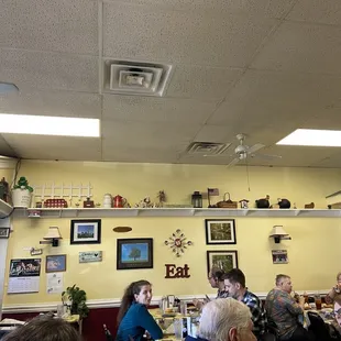 a group of people sitting at a table