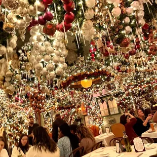 a restaurant decorated for the holidays