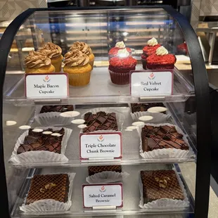 Baked goods freshly put in the case.