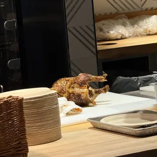 Getting ready to halve the chicken for an order.
